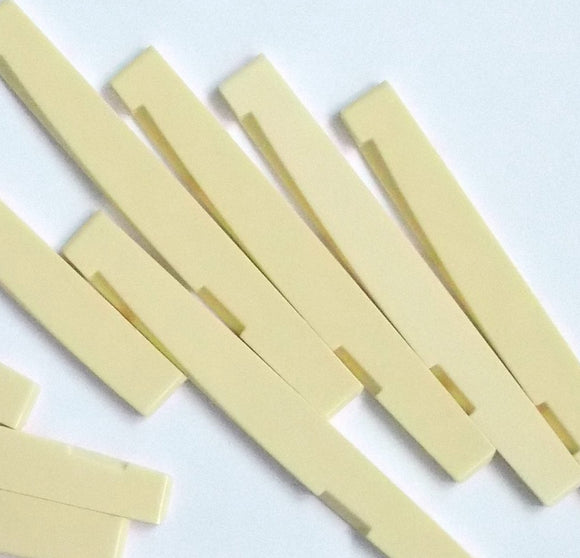 200 PCs Acoustic Guitar Saddles 74 x 3 x 7.8-6.8, Plastic, Ivory Color, A026C